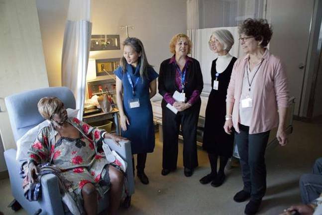 Music Helps Hospice Patients Members of the Threshold Choir sing to a woman at Haven Hospice Specialty Care Unit at Bellevue Hospital on her 72nd birthday. Photos by Mary Newman