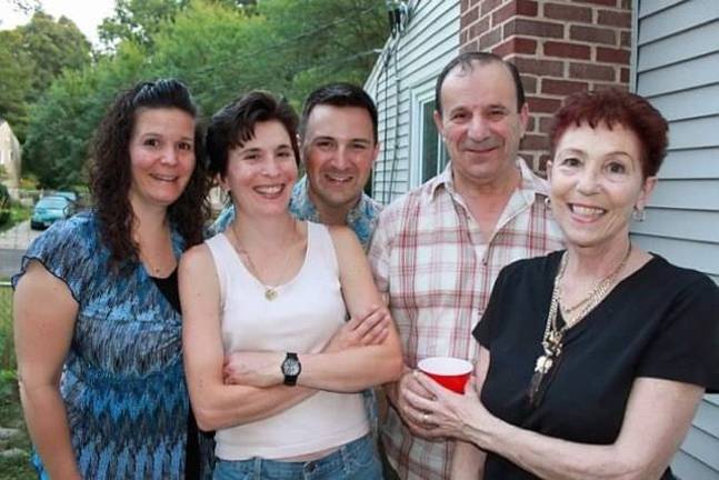 John Trentini takes flight, in medicine and in life The Trentini family: sisters Gina (far left) and Tina; John (center); and parents, Frank and Rose (Photo provided)