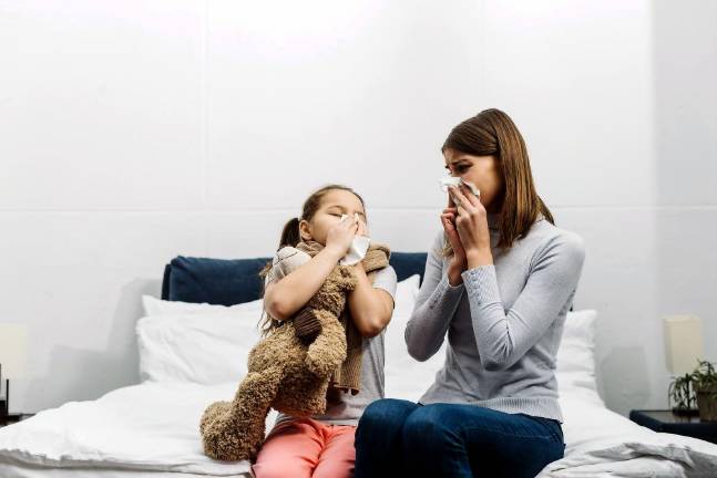 Amid coronavirus fears, a second wave of flu hits US kids Amid coronavirus fears, a second wave of flu hits US kids