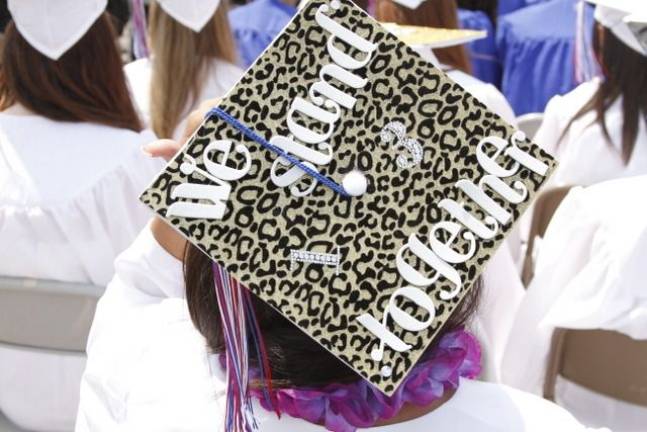 Goshen High School: 'Today as we climb' Julianne Romero's cap broadcasts a message of solidarity. (Photo by Jerry Goldberg)