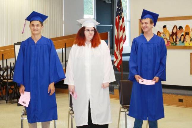 Graduates Jack F. Calzaretta, Kathleen Elizabeth Murphy and Sean Casey Ryan.