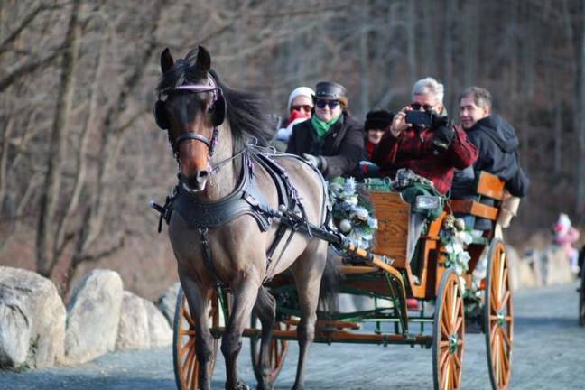 Take a festive carriage ride.