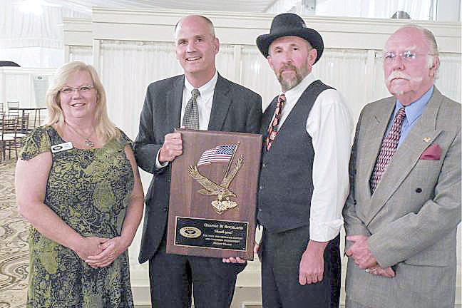 In 2015, Museum Village paid tribute to Orange and Rockland Utilities, Inc. at the museum’s sixth annual gala for its support that helped re-open the Energy Building, one of the museum’s largest exhibits, featuring some of the collection’s largest and most unusual artifacts. Museum Village, of course, was the vision of Roscoe Smith, a local businessman and philanthropist, who, in 1905, started an electric utility company, Orange and Rockland Electric Company of Monroe. Pictured at the 2015 gala are: Museum Village Board of Trustees Secretary Cindi Vasta, O&amp;R President and CEO Tim Cawley, Museum Village Executive Director Michael Sosler, and volunteer consulting engineer Bill Lemanski. Sosler will retired as the museum’s executive director in September after a decade on the job. File photo.