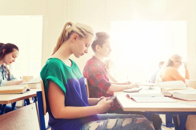 Survey: Should student cell phones be banned in school? Survey: Should student cell phones be banned in school?