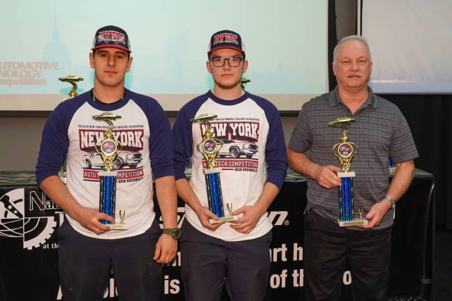 The second-place team from Orange-Ulster BOCES: students Connor McCann and Marco Radi with their teacher Matthew Dykes. They will be working on a Toyota. (Photo: Dominick Totino Photography)