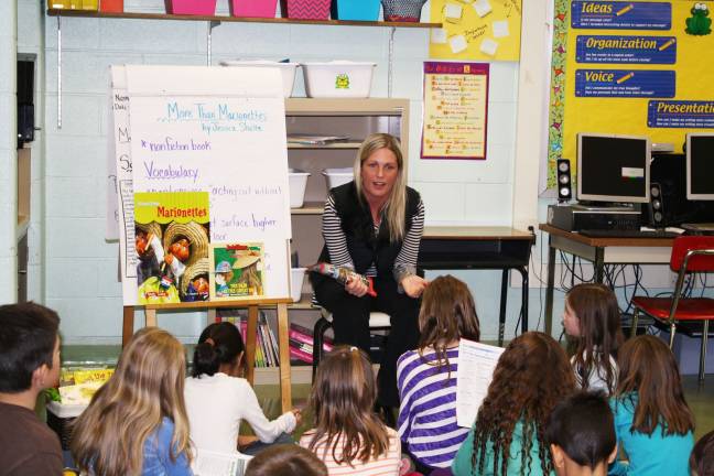 Commissioner of education visits Goshen Intermediate Sarah Scoville engages her students during a group discussion.