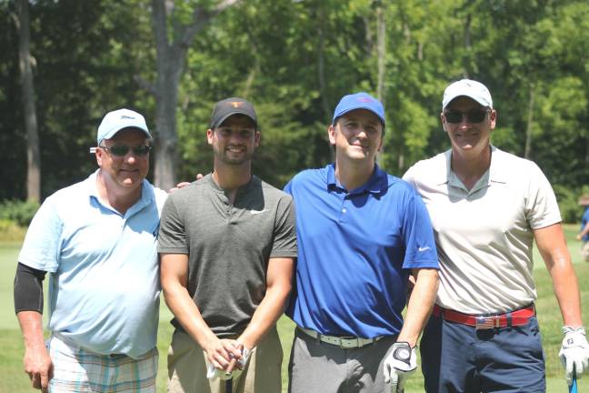 The winning men's foursome (from left): John Pascarelli, Steve Pascarelli, Tom Larsen, and Michael Klugman (Photo provided)