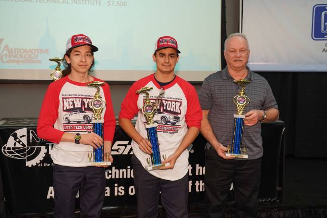 The first-place team from Orange-Ulster BOCES: students Justin Mitts and Kenneth Kohn with their teacher Matthew Dykes. They'll be working on a Chevy in the next round. (Photo: Dominick Totino Photography)