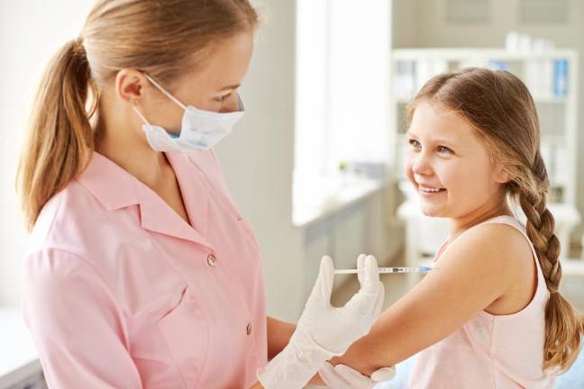 In rough US flu season for kids, vaccine working OK so far In rough US flu season for kids, vaccine working OK so far