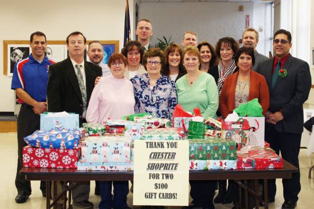 'Adopt a Family' remembers those in need Front row (from left): Daniel Connor, Ann Desiglioli, Mary Ellen Nutley, Lynn Dise, Olga Benton. Middle Row, from left, Gregory Voloshin, Jason Carter, Linda Finnegan, Rosemary Pereira, Andrea McClorey, Lisa Jayne Doyle, William Rolon. Back row, from left, Kurtis Kotes, Henry Freedman, James Sterett. Missing from the photo: Heather Carman, Maureen Farrell, Christina Gore, Deirdre Hallinan, Patricia Lercara, Gayle Scott (Photo provided)