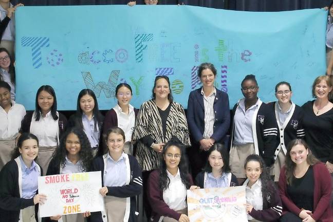 New York State Senator Jen Metzger (SD-42) (back row, fourth from right) joins students at John S. Burke Catholic High School on The Great American Smoke Out