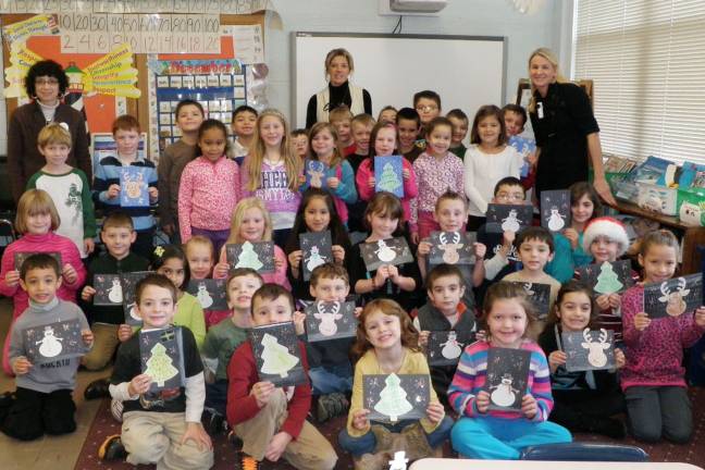 Hey soldier, happy holidays! First-graders with their homemade holiday cards for soldiers.