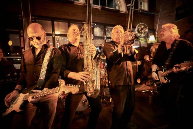 Experience Warwick’s vibrant live music scene Mighty Spectrum Band.