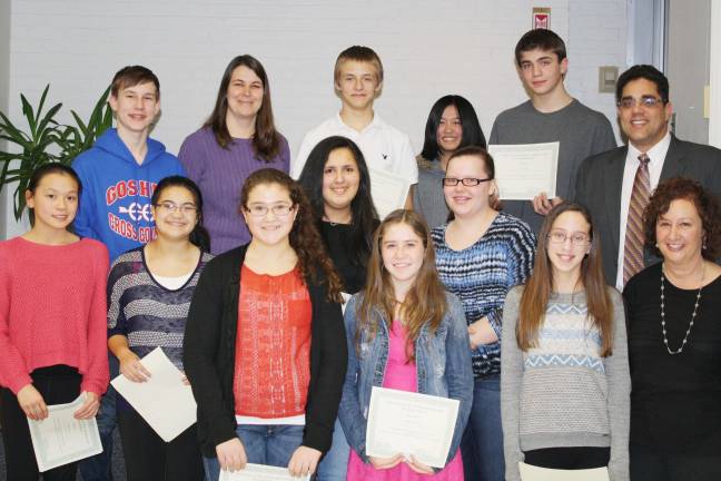 Goshen School Board honors students and faculty The Scholastic Art Award winners. Front row, from left, Rachel Shih, Andie Wong, Laurel Rosario, Samantha Farias, Christina Whittel, Riley Frey, Amanda Kowalczyk, Art Teacher Melissa Ochs. Back row, from left, Kaleb Pease, Art Teacher Christina Pahucki, Andrew Pizarro, Kristen Li, Jonathan Grald, and Principal William Rolon. Not pictured are Grace Atlas, Reaghan Duval, Victoria Schmit and Mary Krasinski.
