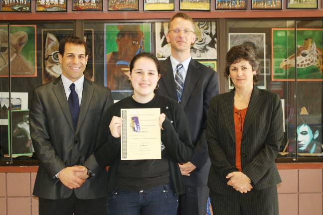 Good job! Abigail Marone received a gold medal and a summa cum laude certificate for her Outstanding Performance in the National Latin Exam. She is pictured with Gregory Voloshin, Assistant Principal/Director of Health, Physical Education and Athletics; Kurtis Kotes, Principal; and Patricia Lercara, Assistant Principal.