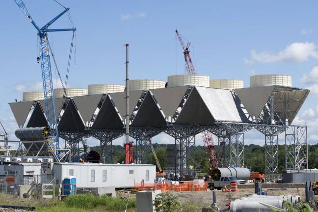 Feds: Former Cuomo aide was inside man for power plant Photo by Robert G. Breese A former aide to Gov. Andrew Cuomo has been charge with soliciting and accepting bribes in return for taking official action to benefit Competitive Power Ventures, which is constructing a power plant in Wawayanda, which will burn fracked gas.