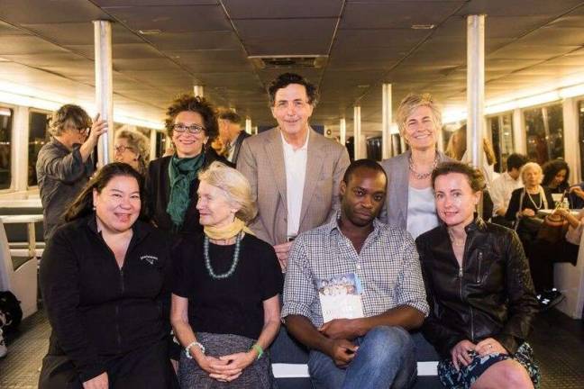‘odyssey’ on the ferry Aboard the ferry. Top row (left to right): Lee Briccetti, Executive Producer of Poets House; Armand Pohan, Chairman of NY Waterway; Nancy Rieger. Bottom row (left to right): Brenda Shaughnessy, Rachel Hadas, Rowan Ricardo Philips, Emily Wilson. Photo: Aslan Chalom