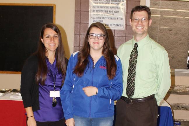 High school students honored as 'Goshen Greats' Katrina Imperio with math teachers Christina Smith and Will Denaxas