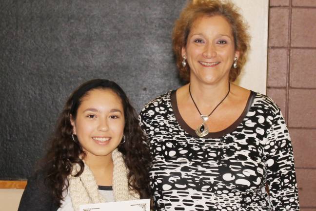 High school students honored as 'Goshen Greats' Noemi Burgos with social studies teacher Anna LaRegina