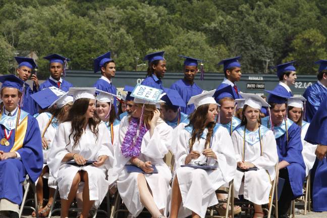Goshen High School: 'Today as we climb' Many of the girls decorated their caps. (Photo by Jerry Goldberg)