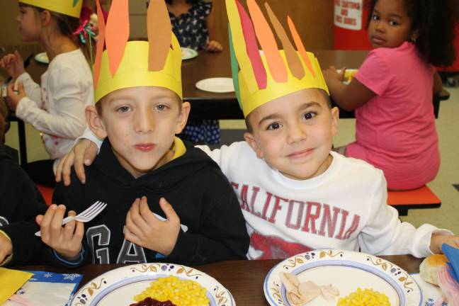 First graders throw Thanksgiving feast Ethan Greico and Nicholas Bruno have fun together at the Thanksgiving feast. (Photo provided)