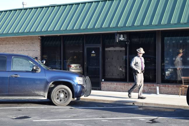 Ex-police officer charged in quadruple murder at Likquid Lounge Photo by Erika Norton State troopers could be seen at the Likquid Lounge in Chester Tuesday afternoon, the site of a quadruple homicide that took place in April, according to prosecutors.