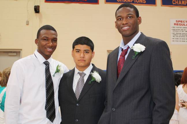 Honors and scholarships for Goshen students on Class Day Dayquan Crandell, Josue Huertero and Raheem Barnaby.
