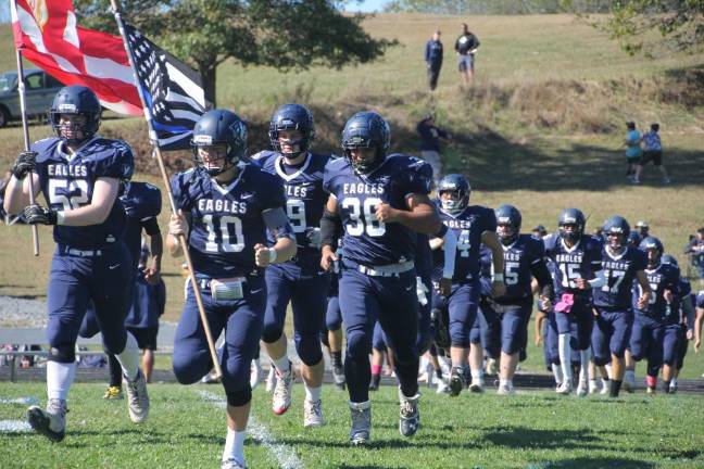 Burke football's young team gets stronger by the week The Burke Catholic football team