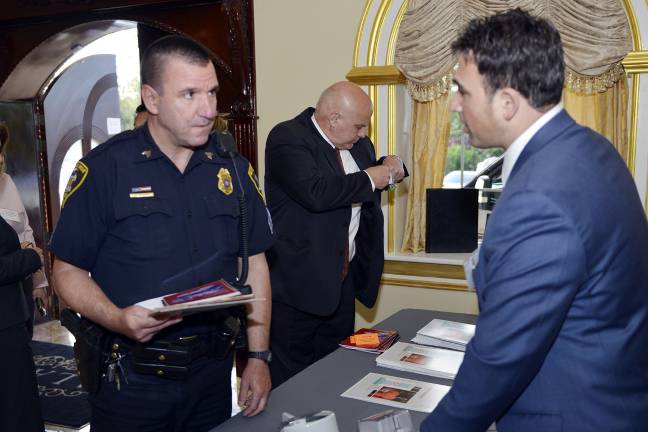 Orange and Sullivan County civic leaders today were briefed on OandR&#x2019;s plans to begin installing smart electric meters and gas modules in March of 2018. Pictured here, at the meeting were, from right: Town of Blooming Grove Police Sergeant Robert McCann, City of Middletown Department of Public Works Commissioner Jacob Tawil and OandR&#x2019;s Mike Pinto.