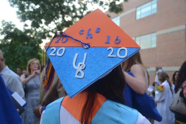 Cierra Melone shows off her graduation cap.