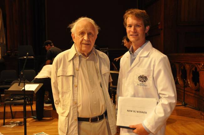 If the shrew fits, swallow it Brian Crandall with scientist and Nobel laureate Roy Glauber (physics, 2005) (Photo provided)