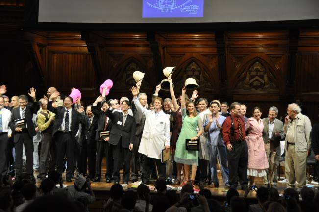 If the shrew fits, swallow it Brian Crandall, center stage, in white labcoat, celebrates his win of the Ig Nobel Prize, along with other honorees and genuine Nobel laureates. (Photo provided)