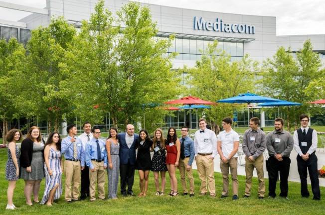 Mediacom Entrepreneur of Tomorrow Award winners honored Photo provided by Mediacom Communications Pictured from left to right are: Ashley Murphy (Middletown High School), Elizabeth Bisone (S.S. Seward Institute), Lidice Villalpando-Guitierrez (Valley Central High School), Jathan Ramjattan (Mount Saint Michael Academy), Gabriel Vargas (Mount Saint Michael Academy), Godriel Roman (Mount Saint Michael Academy), Olivia Fini (Goshen High School), Rocco B. Commisso (Mediacom Chairman and CEO), Rocio Lucero (James I. O'Neill High School), Emily Eder (Warwick Valley High School), Cierra Melone (Chester Academy), Tyler Knox (Washingtonville High School), James Galvin (John S. Burke Catholic High School), Benjamin Vondrak (Cornwall High School), Dylan Czubak (Minisink Valley High School), Joseph Bock (Port Jervis High School) and Christian Brown (Pine Bush High School). Not pictured: Soheila AliDad (Monroe-Woodbury High School) and Emily Ramirez-Rosales (Newburgh Free Academy). Mount Saint Michael Academy is in the Bronx and is Mediacom Chairman Commisso's alma mater.