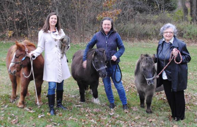 From left, co-founder and Chief Financial Officer Barbara Fontaine with Blaze and Chick-pea, co-founder Kay O’Hanlon Myruski with Jasmine, and Jane Gyulavary, director of donor and public relations, with Mouse.