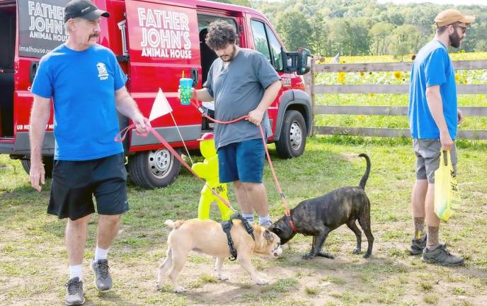 Father John’s Animal House came to promote pet adoptions (Photo by Sammie Finch)