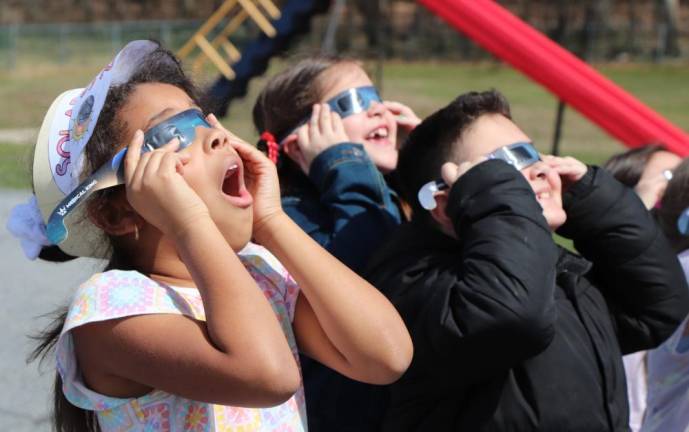 Scotchtown Avenue Elementary School students and teachers got a chance to witness this event.