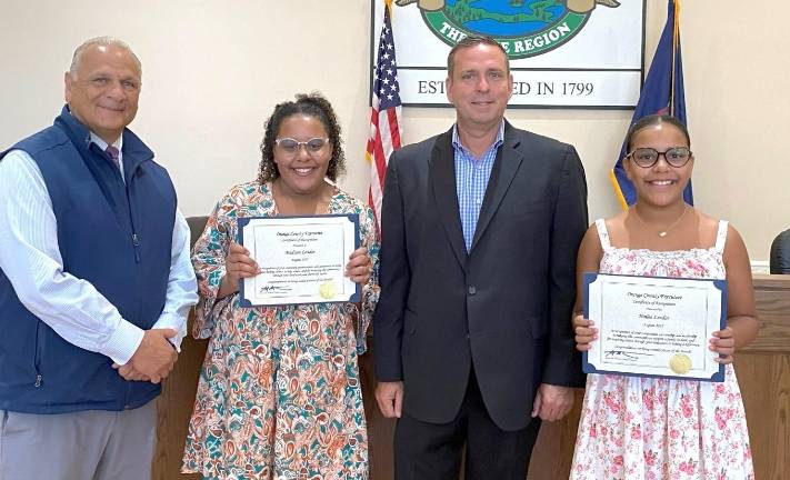 Hailee and Madison Lendor named Citizens of the Month Monroe Town Supervisor Tony Cardone, Madison Lendor, County Executive Steve Neuhaus, and Hailee Lendor.