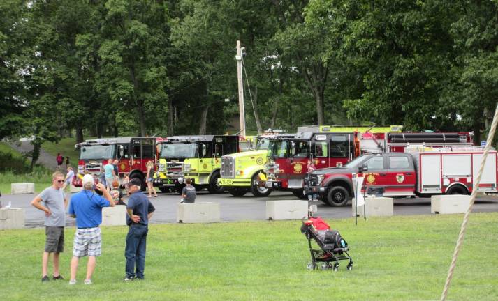 Chester Fire Department makes a splash with its new fleet Chester’s new vehicles (from left): Engine 1, Engine 2, Tanker 2, Engine 3, Utility 3. Standing in front are past-Chiefs Jerry Murray and Steven Zoutman and Chief Joseph Verbet III.