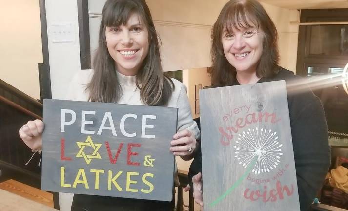 Lori Robertson of Cornwall and Elyse Stock of Highland Mills display the Chanukah decorations they created.