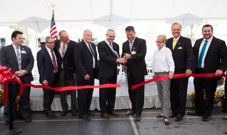 Orange Regional expands with new cancer center, office building On Sept. 19, Orange Regional Medical Center and Orange Regional Medical Group held a ribbon-cutting ceremony in celebration of the official opening of the new Physician Office Building and Spagnoli Family Cancer Center. Pictured (from left): Stephen J. Sugrue, VP, Compliance, Real Estate and Audit, GHVHS; Dr. Jeffrey Stewart, Medical Director, Cancer Center Representative; Dr. James Oxley, Orange Regional Medical Group; Terry Olivo, ORMC Chairman, Board of Directors; Darrell Supak, GHVHS Chairman, Board of Directors; Scott Batulis, President and CEO, GHVHS; Aileen Gunther, New York State Assemblywoman; John Bonacic, New York State Senator and Dan Depew, Town of Wallkill Supervisor. Not pictured isMadeline Spagnoli. (Photo provided)