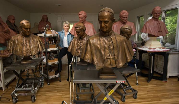 Sculptor Carolyn Palmer breathes life into famous faces Carolyn Palmer in her studio while working on the four popes for St. Patrick's Cathedral (Photo: ART Media)