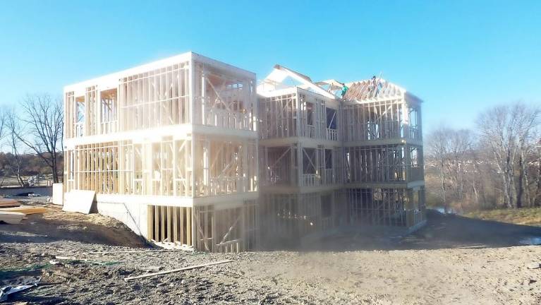 The first house within the Greens of Chester now reaches roof level. Photo by Frances Ruth Harris.