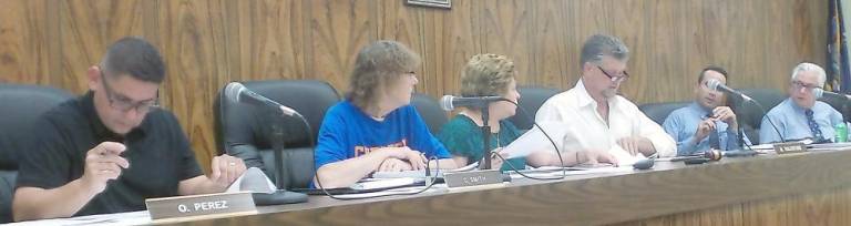 The Chester Town Board at a recent meeting (from left): Orlando Perez, Cindy Smith, Heidi Schmid (deputy town clerk), Robert Valentine (supervisor), Ryan Wensley, and Vinny Finizia