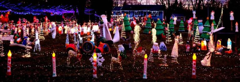 With more than 50,000 lights and music, no Town of Warwick home has attracted more tourists at Christmastime. Photos by Roger Gavan.