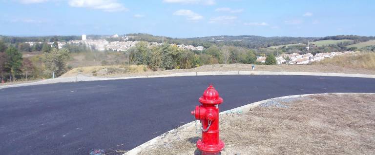 A new hydrant at the Greens of Chester. The builder and the town's building inspector have very different ideas about the development's water permits.