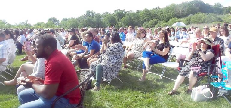 Parents, families and friends await the beginning of the 136th annual commencement in the fields of Chester.
