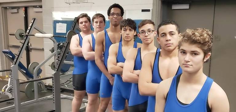 The seven seniors on the Chester wrestling team. From front to back: Summer Conetta, Bryan Sahad, Edwin Rodriguez, Mark Bruckenstein, Kwalin Gonzalez, Dylan Bullock and Devin McGovern.
