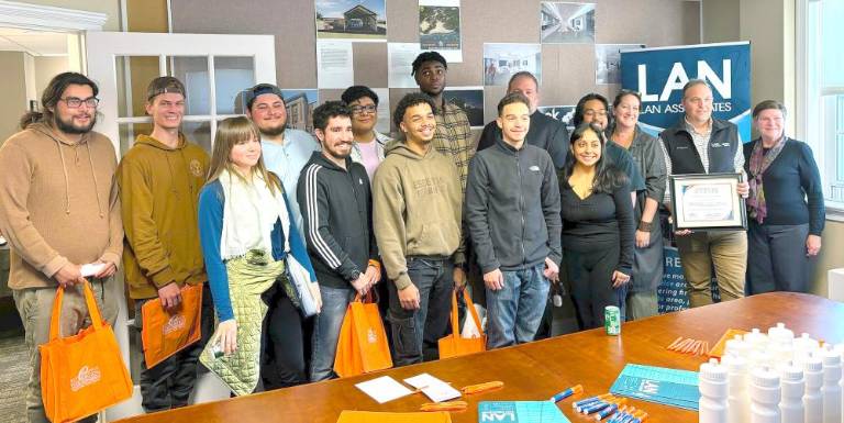 SUNY Orange students pose with LAN Associates’ Jim Diana, as well as college faculty and LAN staff, following a recent visit to the firm’s Goshen location. Students in attendance included: Isabella Aragon-Nava, Kevin Delgado, Jordany Gil, Ravi Krishnomoorthy, Matthew Santiago, Jeremiah Seymour, Carla Spensieri, Ryan Stack, Eli Urena Jr., James Vance and Tom Zaharek. The students were accompanied by professors Chuck Passarotti and Pam Rice.