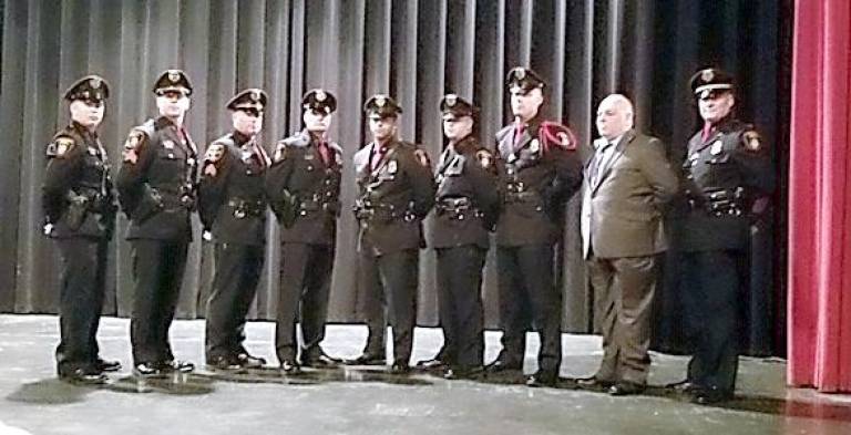 Patrolman Jeremy Harter is police academy valedictorian Patrolman Jeremy Harter is congratulated by members of the Village of Goshen Police Department