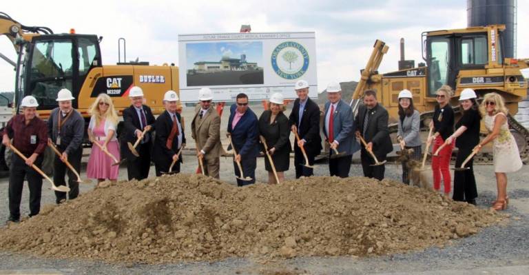 Pictured from left to right are: Director of Professional Services Scott Razzano, Deputy Commissioner of Infrastructure Services Brian Titsworth, Legislators Kathy Stegenga and Barry Cheney, Deputy County Executive Harry Porr, Legislator Joe Minuta, County Executive Steven M. Neuhaus, Chairwomen of the Legislator Katie Bonelli, Commissioner of Public Works Erik Denega, Legislator Pete Tuohy, Legislator Paul Ruszkiewicz, Health Commissioner Dr. Alicia Pointer, Jacki De Chiara, Director of Operations at the Orange County Medical Examiner’s Office, Medical Examiner Dr. Jennifer Roman and Legislator Janet Sutherland.